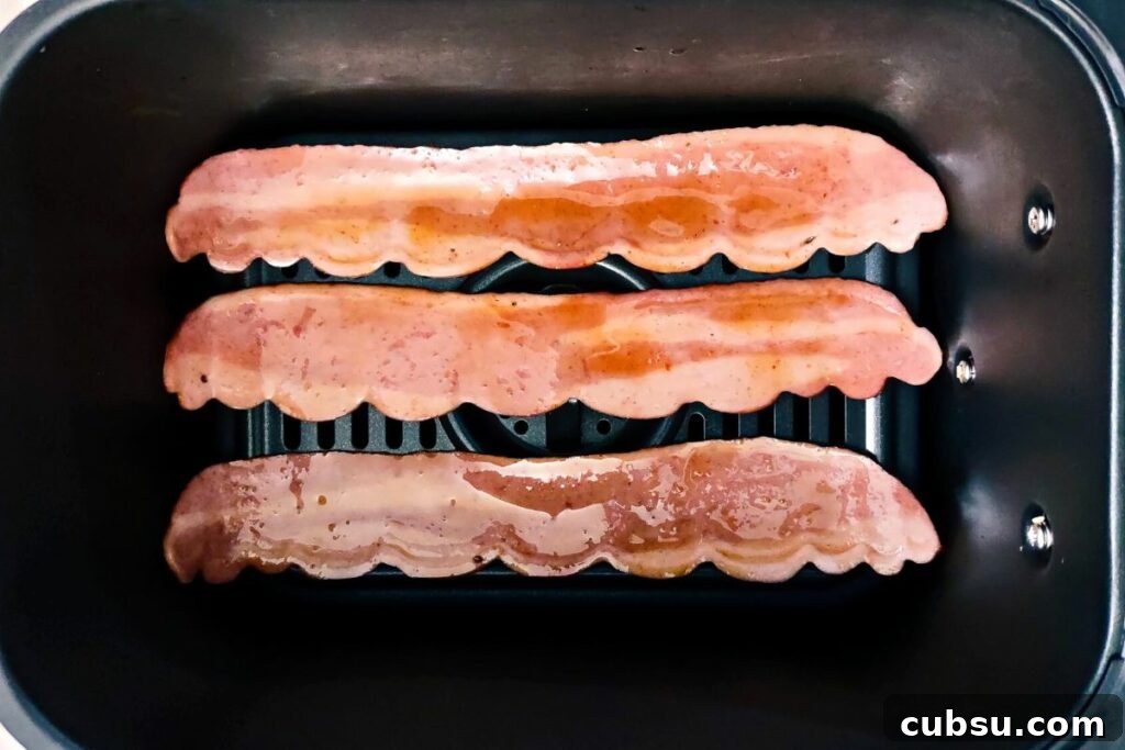 Crispy Air Fryer Turkey Bacon with Quick Sandwich Recipe 5 place seasoned turkey bacon in air fryer basket