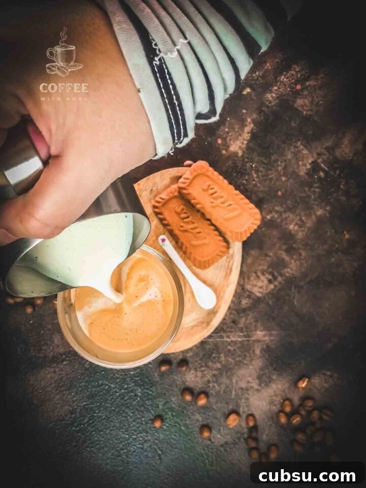 Top with Biscoff milk.