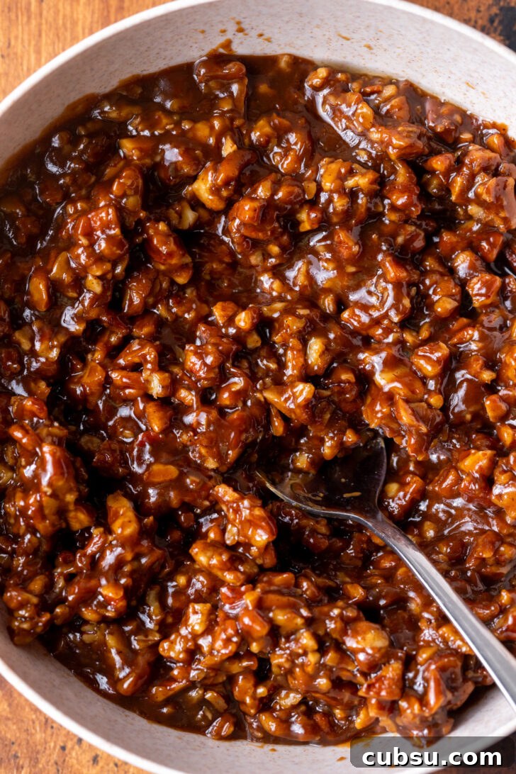 Pecan pie filling in a bowl.