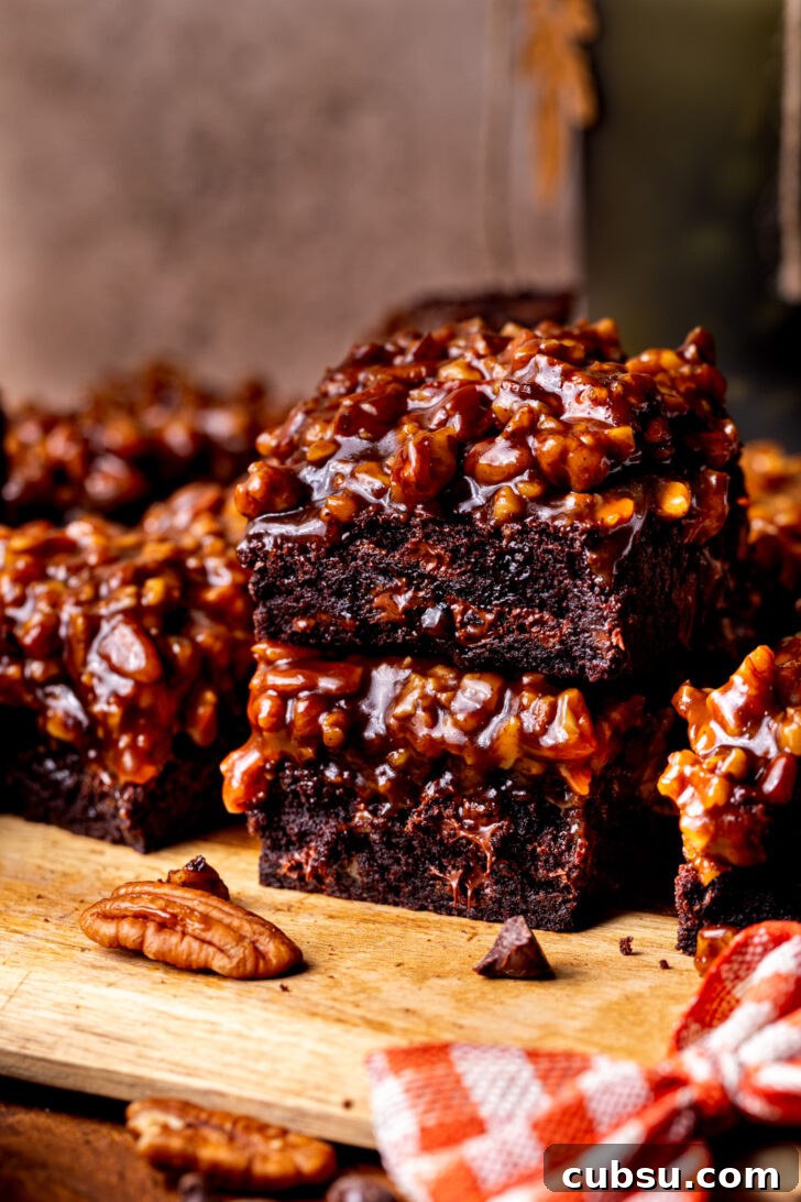 Stack of two pecan pie brownies.