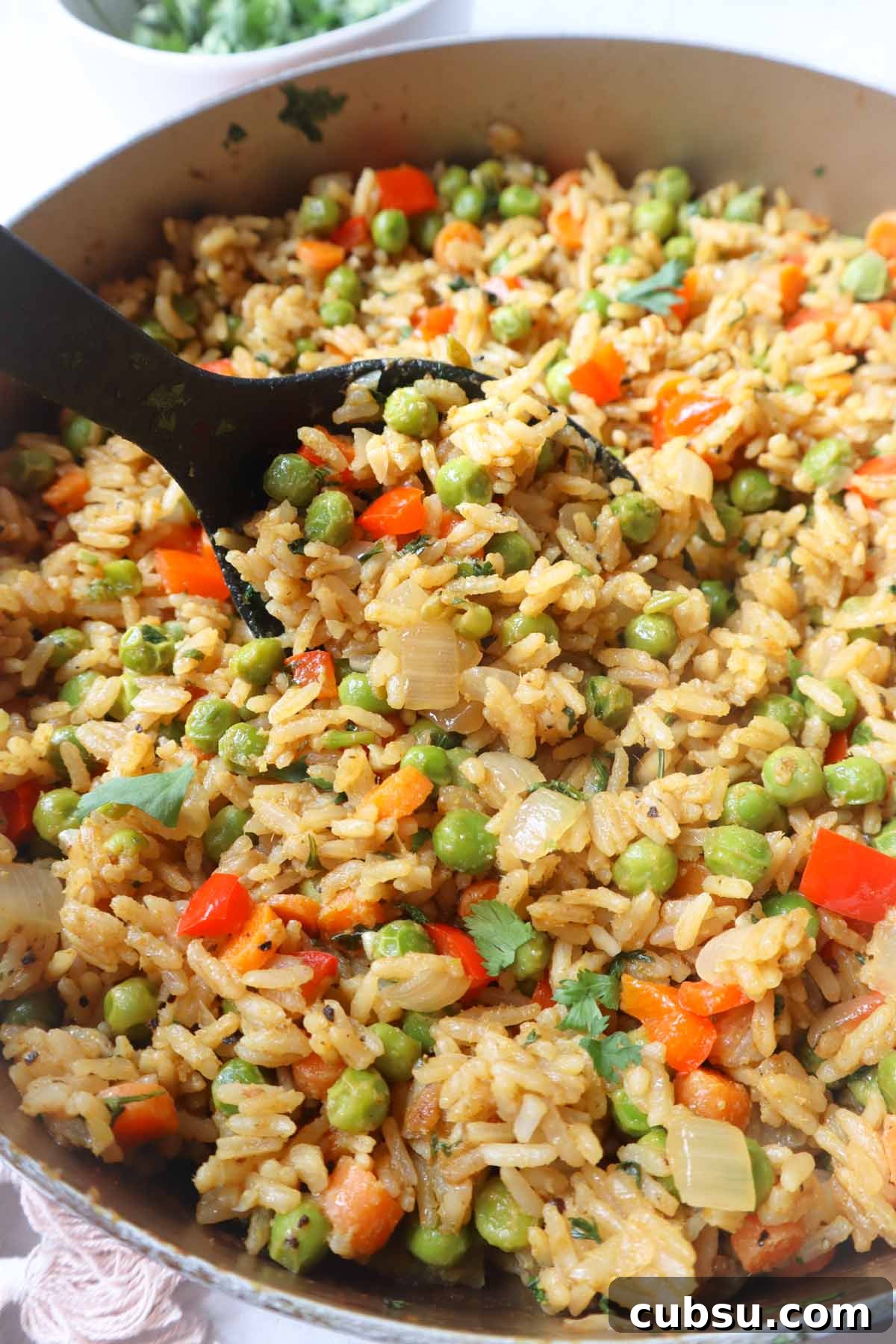 Green Curry Fried Rice Recipe: Authentic Thai Flavor in 30 Minutes 4 green curry fried rice in a large skillet with carrots, peas, and pepper