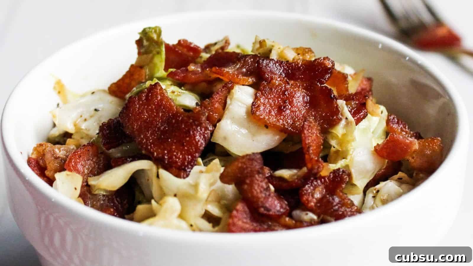 17 Timeless Grandma Recipes You Need to Try Now 8 Bowl of sautéed cabbage topped with crispy bacon strips.