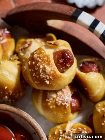 A platter of Sourdough Discard Pretzel Pigs in a Blanket.