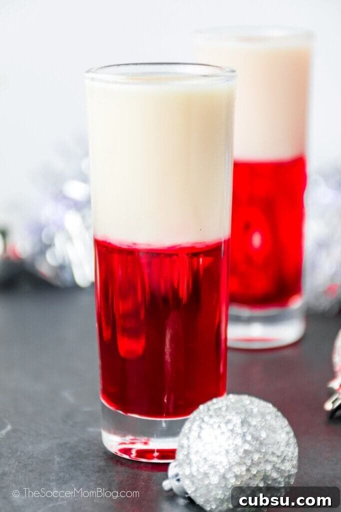 Festive Tipsy Santa Shooters Recipe for Holiday Parties 2 red and white layered shot (cocktail)