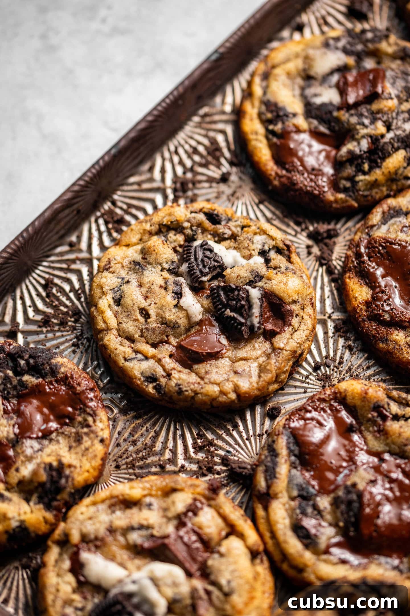 Chewy Oreo Chocolate Chip Cookies Recipe for Ultimate Indulgence 12 Oreo chocolate chip cookies on a cookie sheet.
