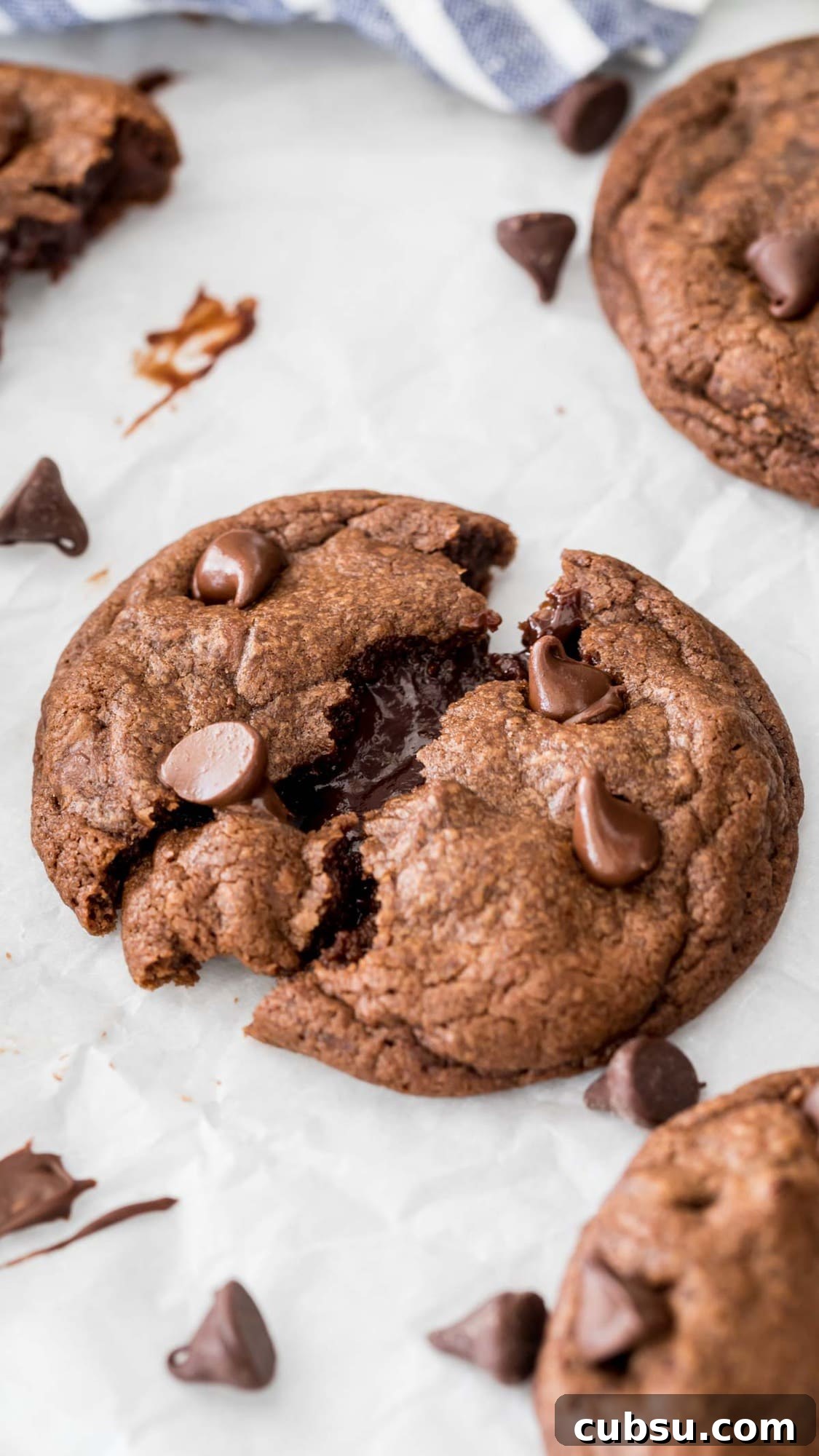 Chewy Fudge Chocolate Cookies Recipe 6 a fudge cookie that's just been split in two, with fudge flowing from the center