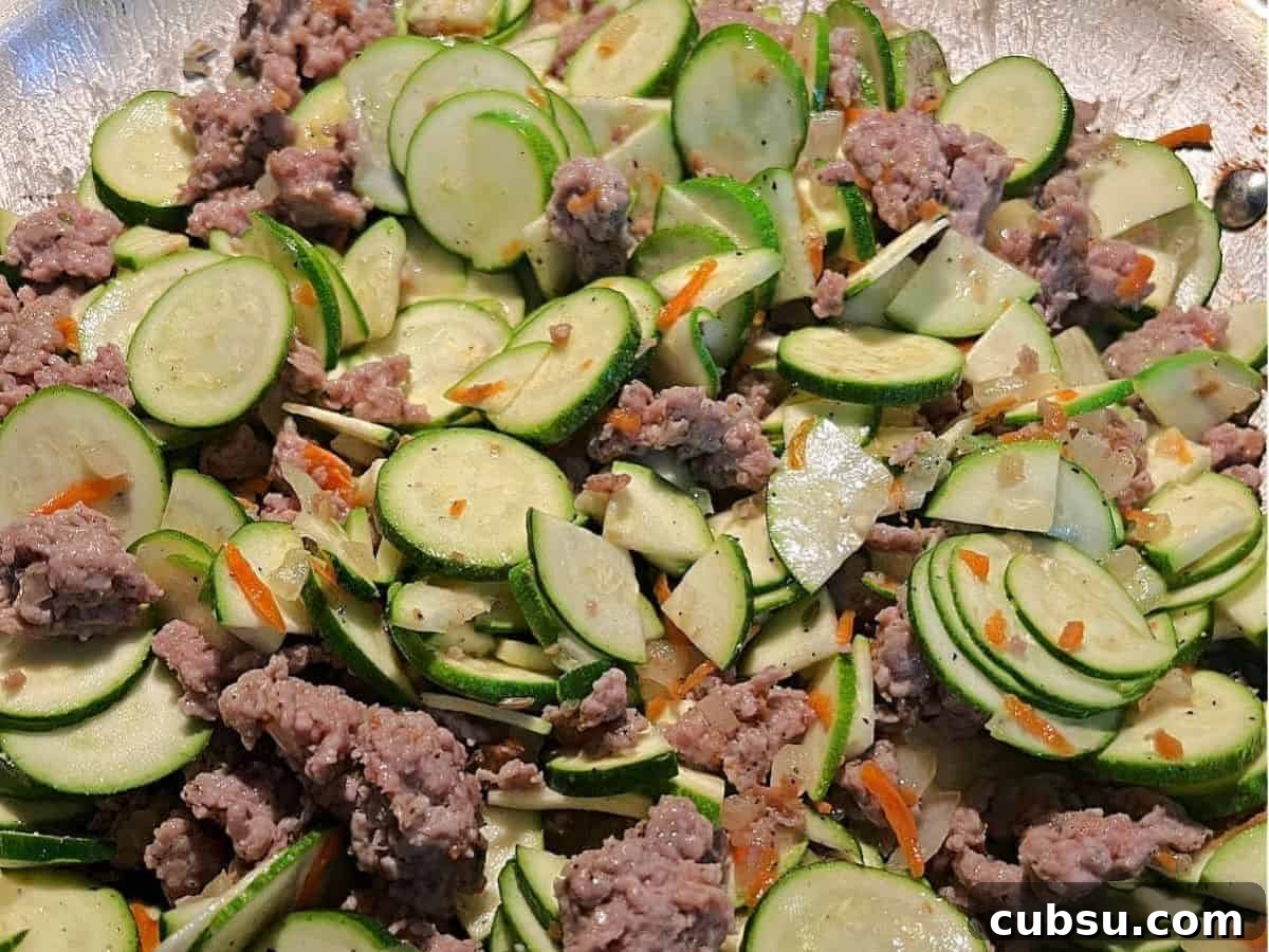 25 Comforting Casserole Recipes Everyone Will Crave 25 Zucchini Casserole with Sausage