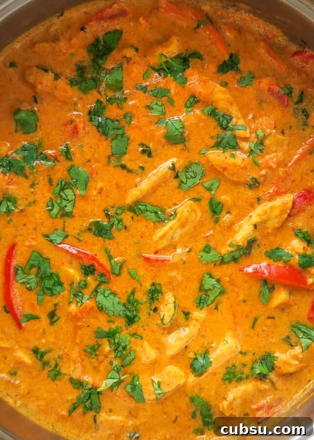 Overhead shot of Thai Red Curry Chicken in a skillet
