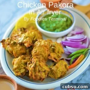 Chicken Pakora air fryer served in an oval plate