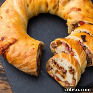 Baked prosciutto bread (lard bread) on slate serving plate.