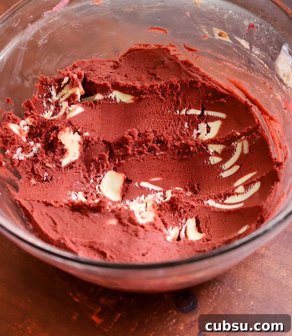 How to Make Classic Red Velvet Cookies with Cream Cheese Filling 7 red velvet cookie dough in a mixing bowl