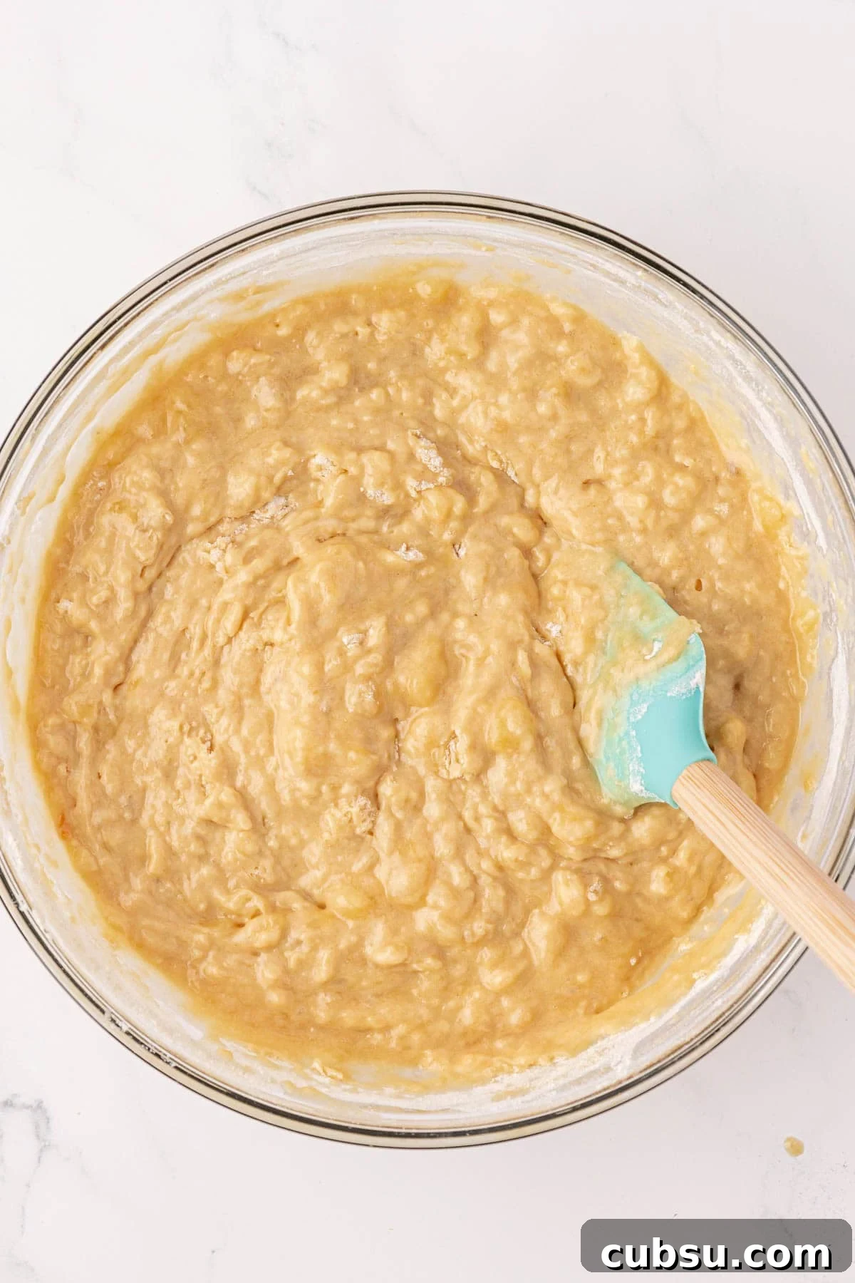 Moist Greek Yogurt Banana Bread Recipe for Tender Loaves 12 greek yogurt banana bread batter mixed together