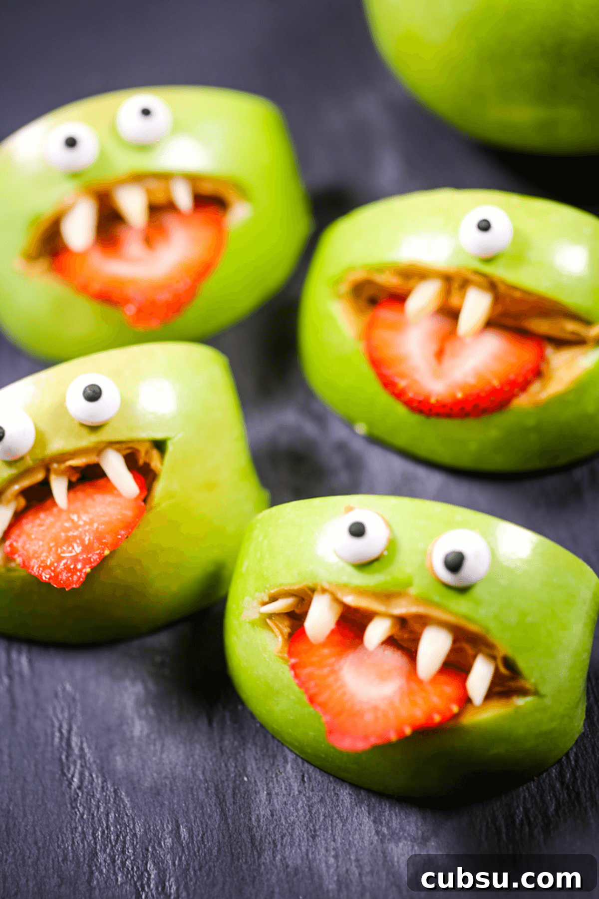 Halloween Apple Monster Snack Ideas 3 A group of the treats.