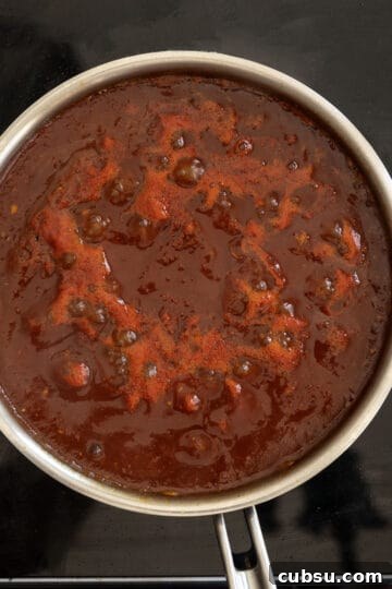 Chipotle Barbecue Sauce Recipe: Smoky, Tangy Homemade BBQ 7 simmering bbq sauce