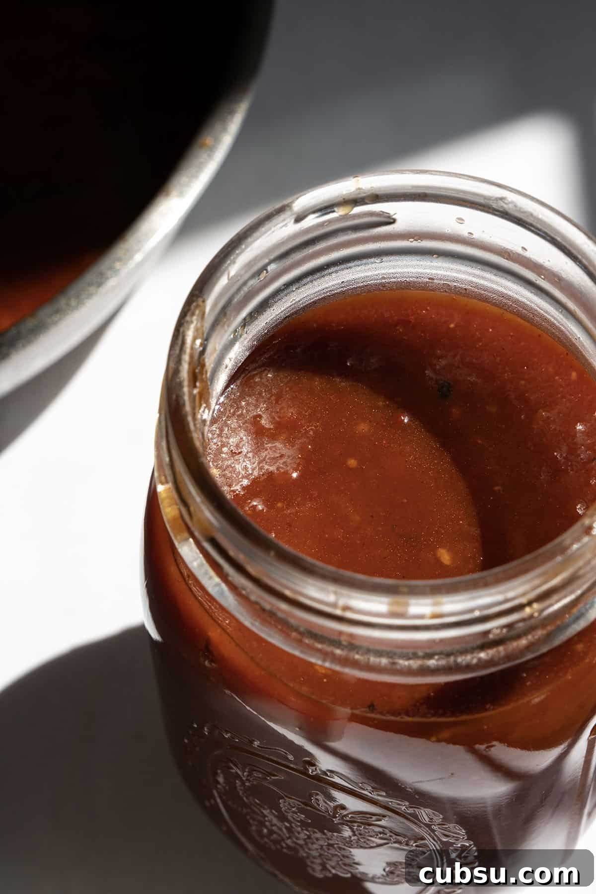 Chipotle Barbecue Sauce Recipe: Smoky, Tangy Homemade BBQ 8 chipotle bbq sauce in a mason jar