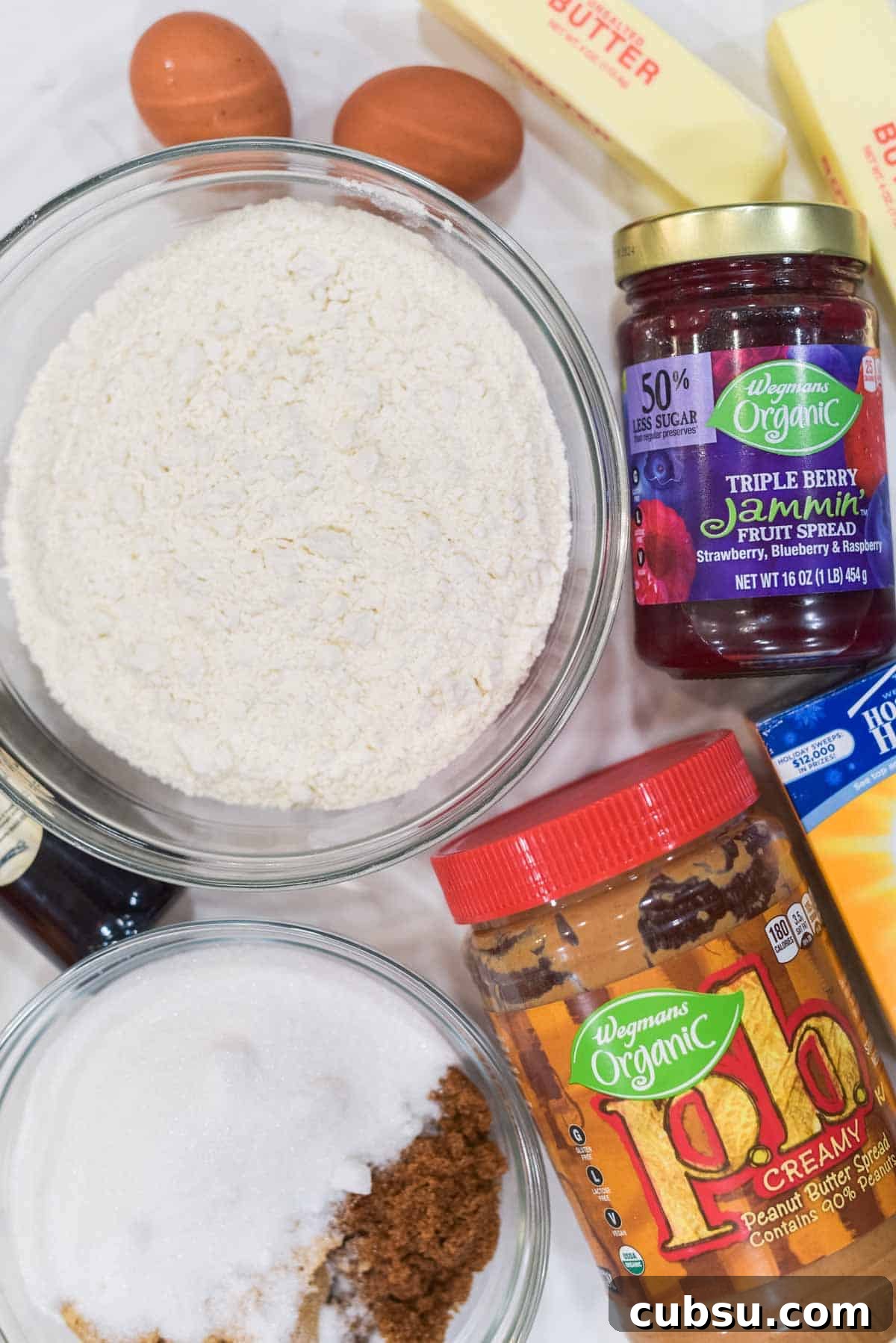 Peanut Butter and Jelly Cookie Recipe — Classic PB&J Cookies 3 overhead shot of ingredients for peanut butter and jelly cookies