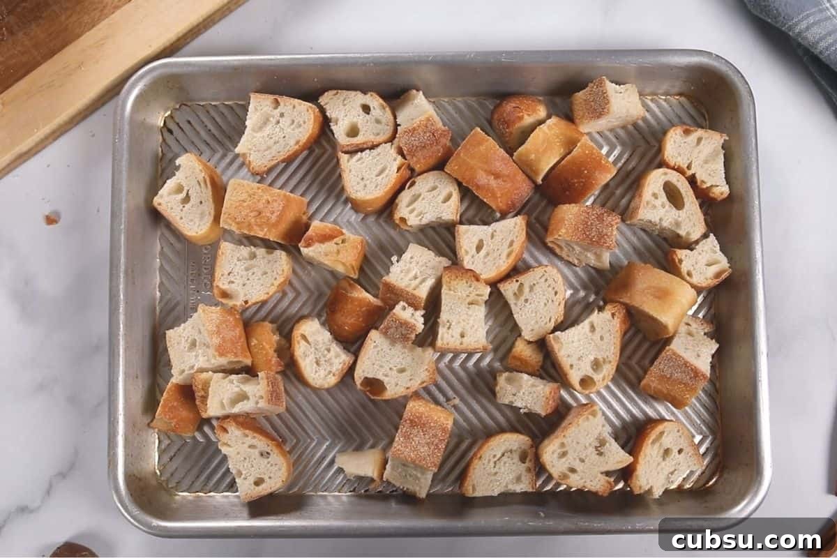 Pressure Cooker French Toast Casserole Cubed Bread on metal tray for French Toast.