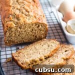 25 Creative Uses for Sourdough Discard: Recipes & Tips 17 Loaf of sourdough banana bread on a cooling rack