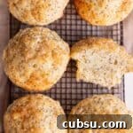 25 Creative Uses for Sourdough Discard: Recipes & Tips 20 Lemon muffins with coarse sugar sitting on a cooling rack