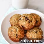 25 Creative Uses for Sourdough Discard: Recipes & Tips 21 A plate with sourdough banana oat muffins with chocolate chips.