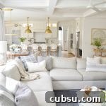 living room and kitchen with brass high end lighting