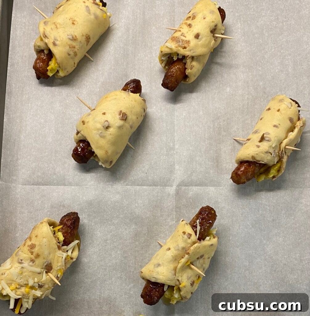 Savory Breakfast Pigs in a Blanket Recipe for Busy Mornings 7 Pigs in a blanket before cooking on the baking sheet