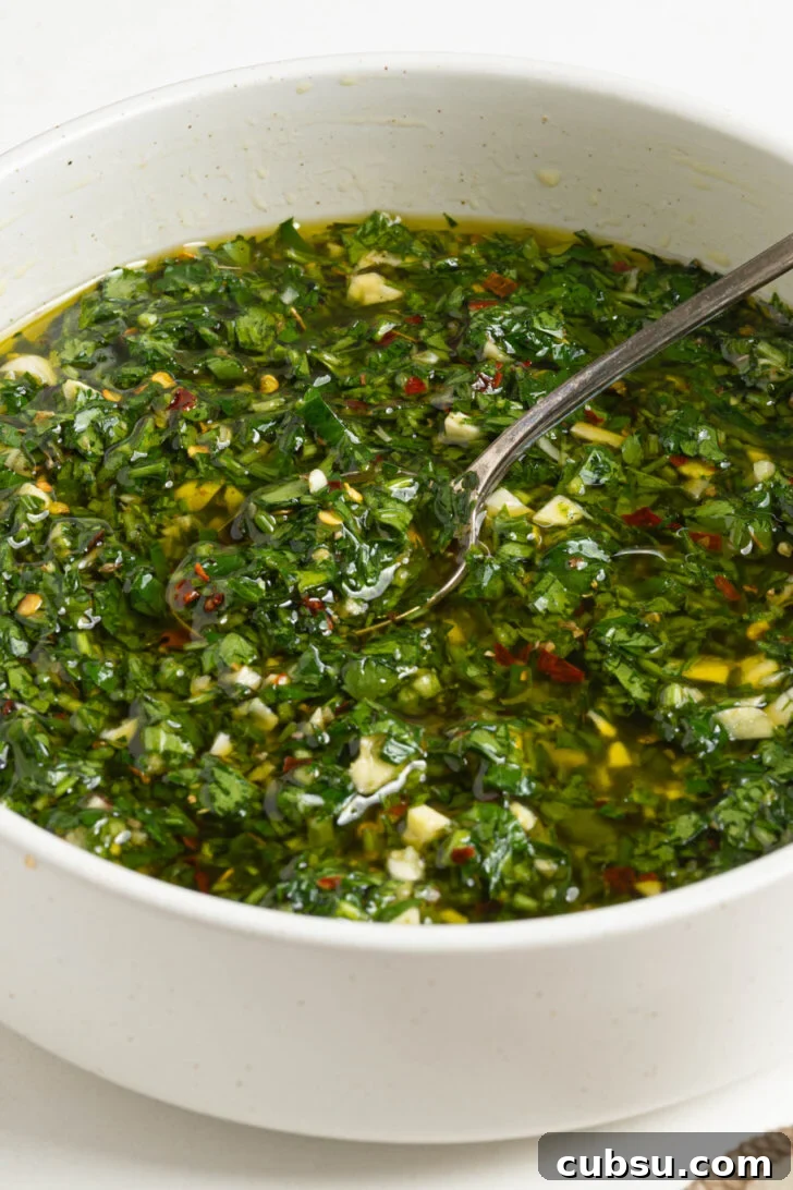A bowl of chimichurri sauce.