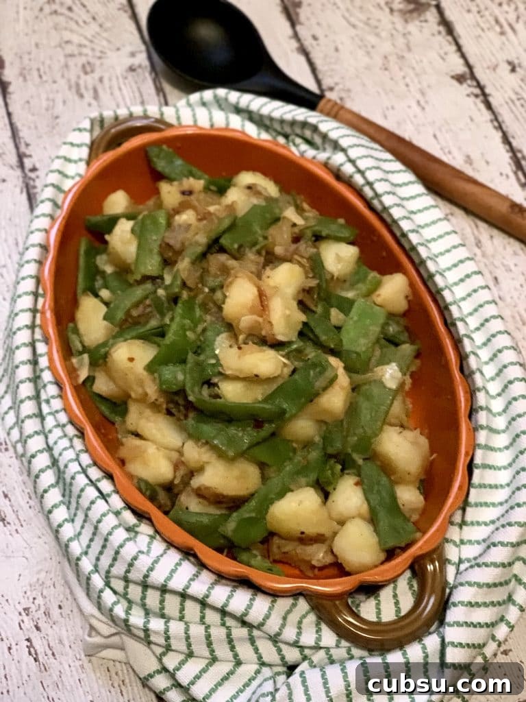 Italian Green Beans and Potatoes Finished in Platter with Spoon