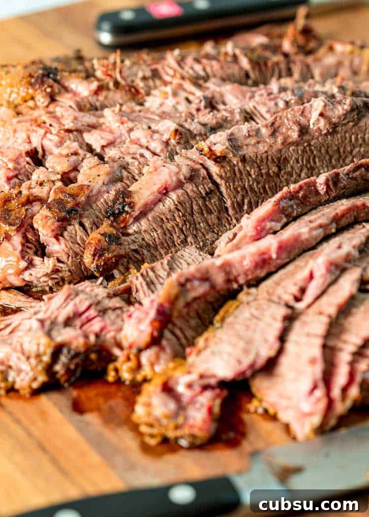 Yankee Pot Roast starts with a pan seared, seasoned beef brisket that gets braised then served with vegetables and a gravy made from the braising liquid. sliced braised beef brisket