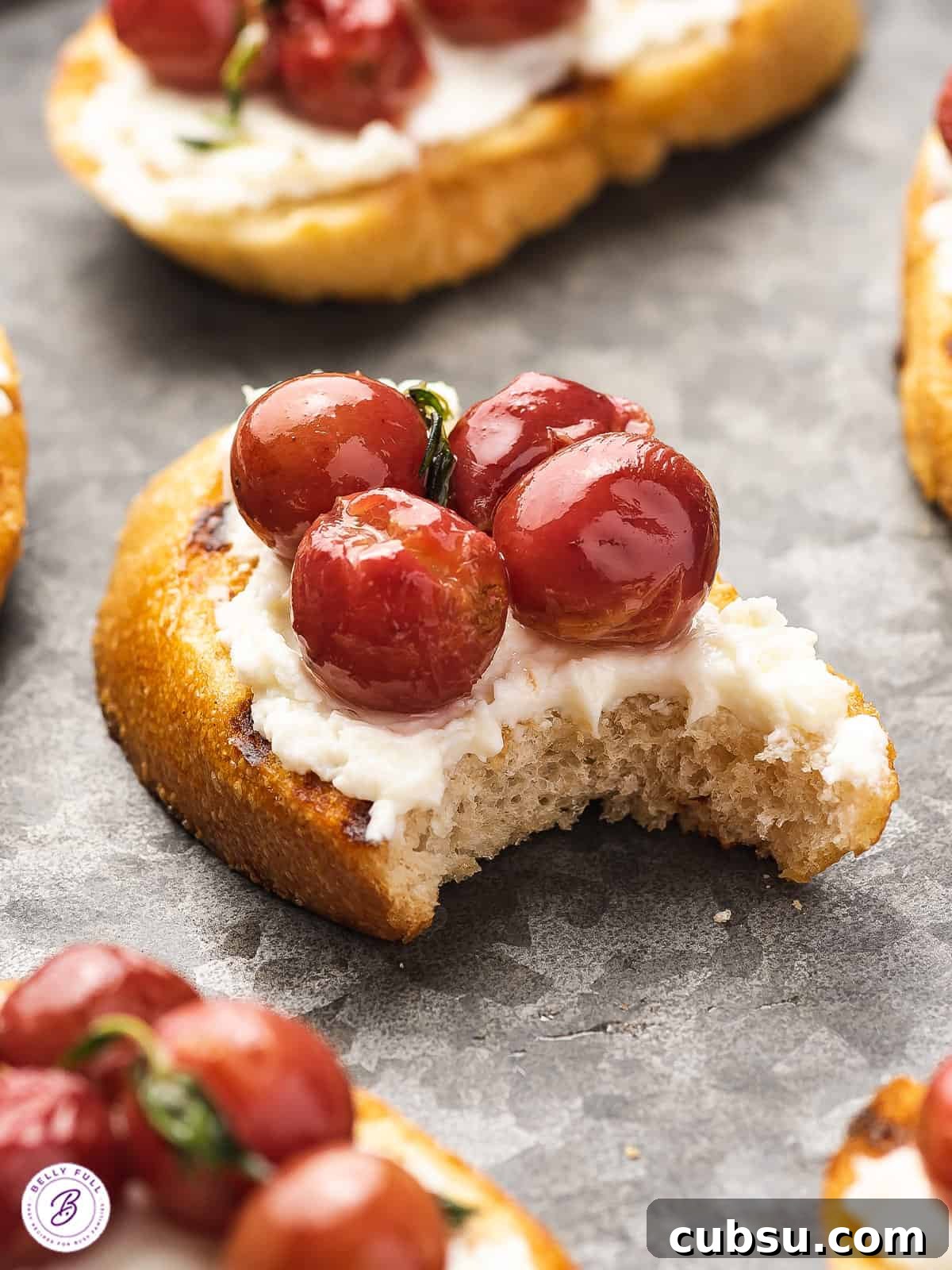 Roasted Grapes Recipe: Sweet Caramelized Grapes for Savory Dishes 5 bite of crostini with roasted red grapes and ricotta