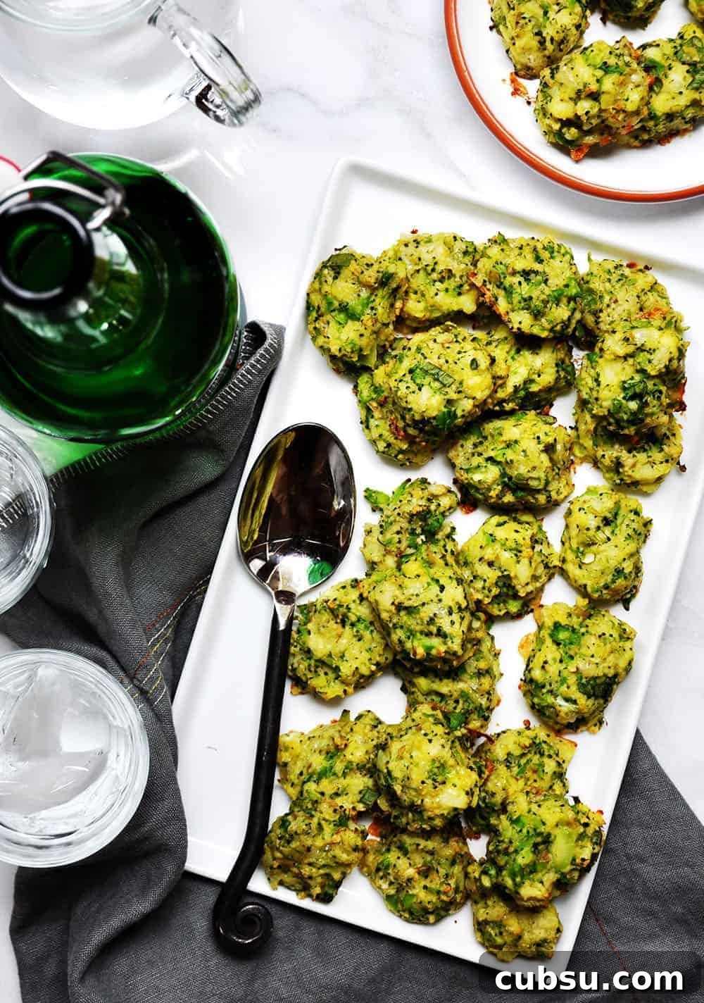 Crispy Baked Broccoli Tots: Kid-Friendly Veggie Snacks 2 Broccoli Tots served on a white platter