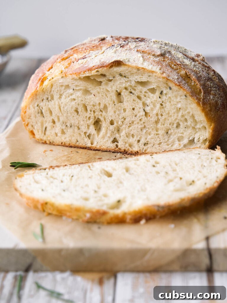 Rosemary Sea Salt Sourdough Bread Recipe for Crispy Crust 7 Rosemary sourdough bread sliced open to show interior