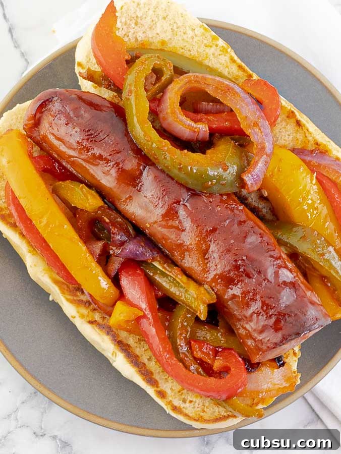 Sheet Pan Polish Sausage Sandwich Recipe on a grey plate