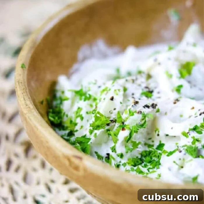Weekly Meal Plan: Sept 3–9, 2024 – 7-Day Dinners & Prep Guide 18 Cucumbers in sour cream in a yellow-ware bowl.
