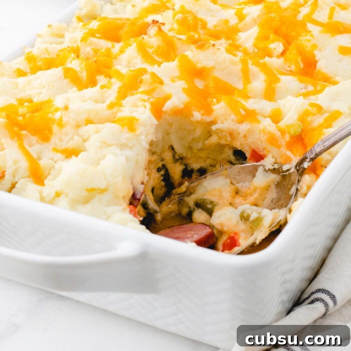 Weekly Meal Plan: Sept 3–9, 2024 – 7-Day Dinners & Prep Guide 20 Closeup of smoked sausage shepherd's pie with a serving removed.