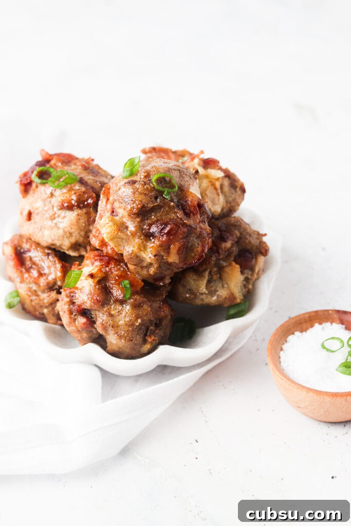 Week 21 Paleo Meal Plan: 7-Day Recipes & Grocery List 3 meat muffins in a bowl stacked on each other