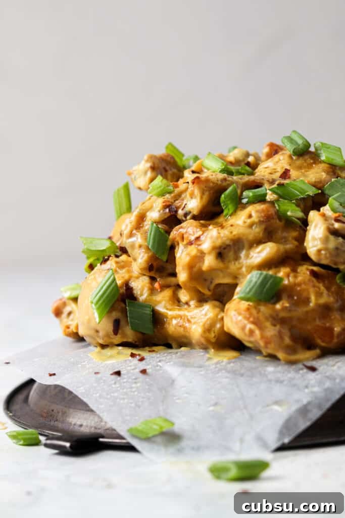 Week 21 Paleo Meal Plan: 7-Day Recipes & Grocery List 8 far away shot of honey mustard wings on a metal tray