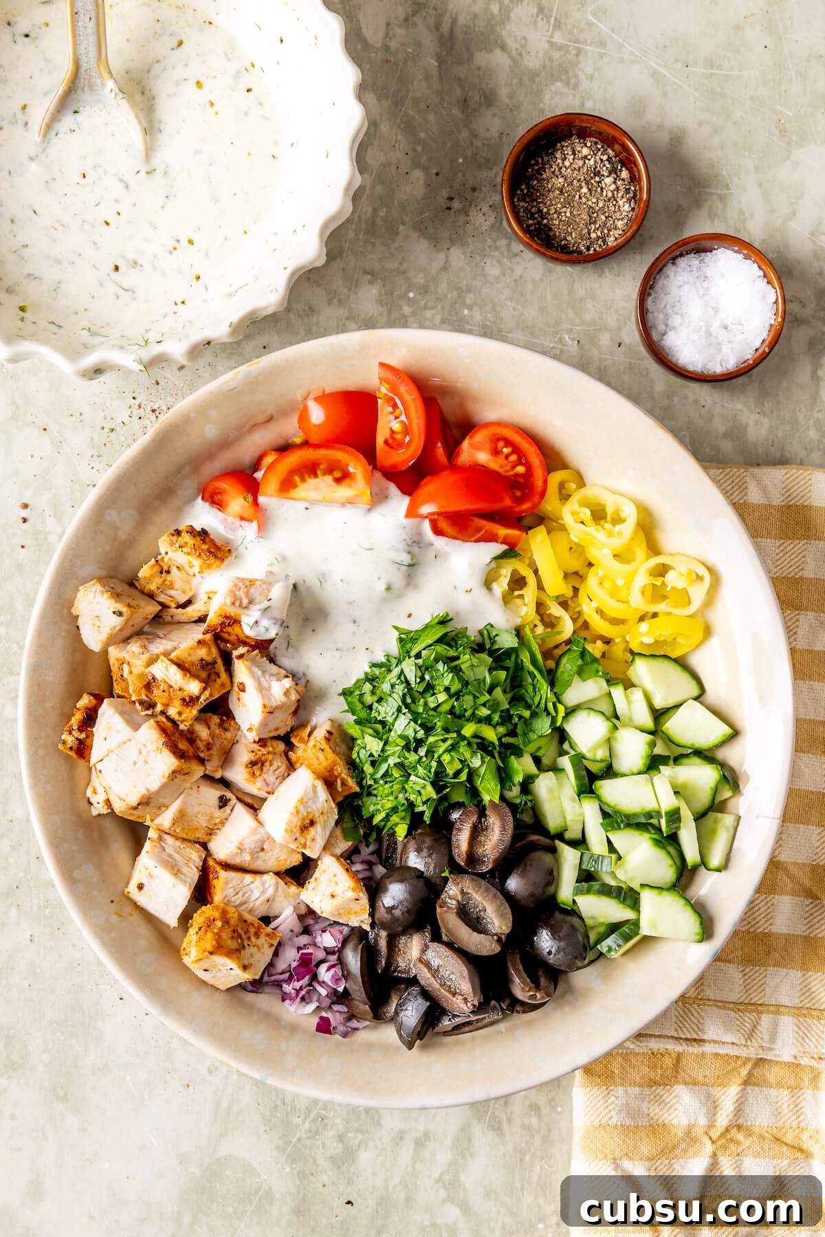 High-Protein Greek Chicken Salad with Feta & Tzatziki Dressing 14 How to Make High Protein Greek Chicken Salad Step 6 - Olivia Adriance