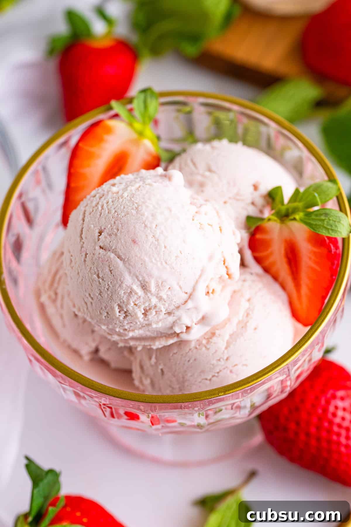 overhead image of Strawberry ice cream in a serving glass