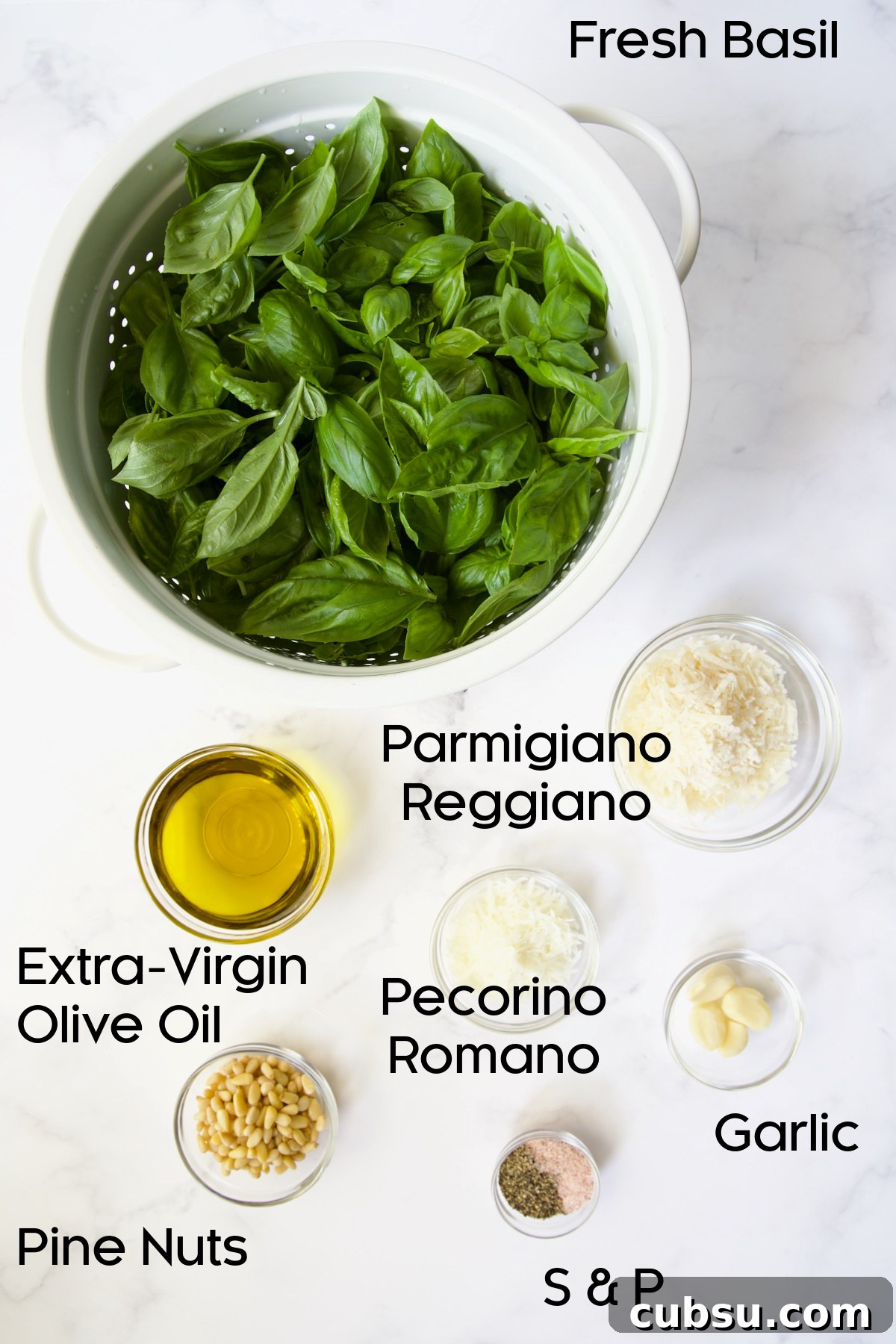 Ingredients for Pesto Genovese on marble countertop.