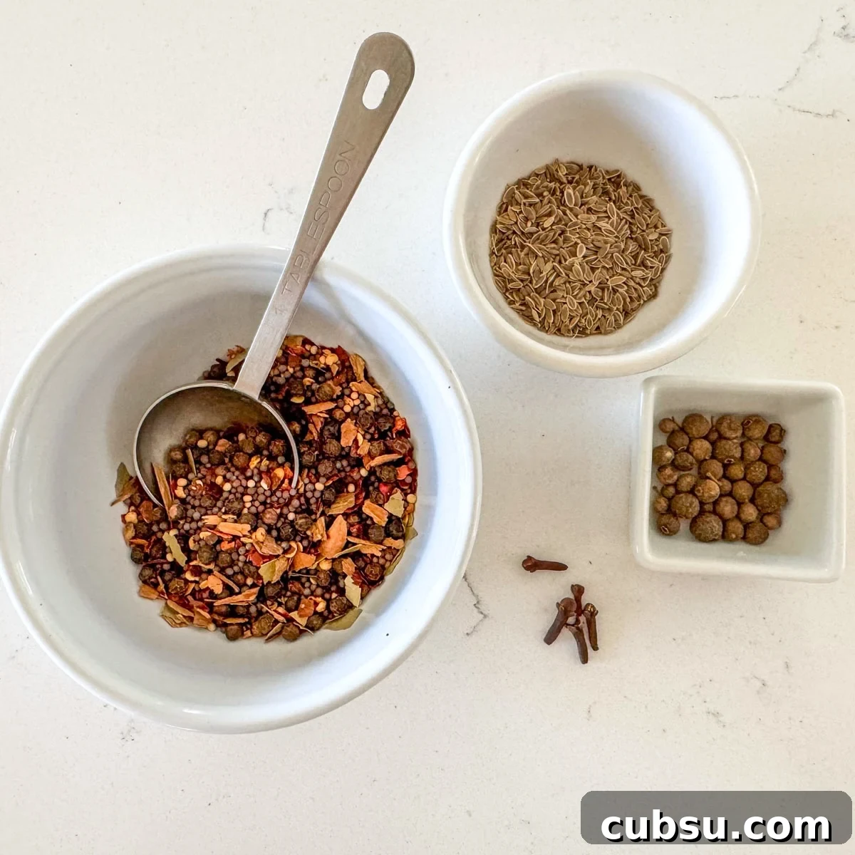Customizable Pickling Spice Blend Recipe for Every Jar 4 mixing up the pickling spice recipe with optional additions