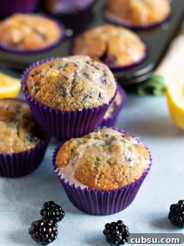 Blackberry and lemon muffins stacked up