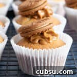 Biscoff muffin on a cooling rack.