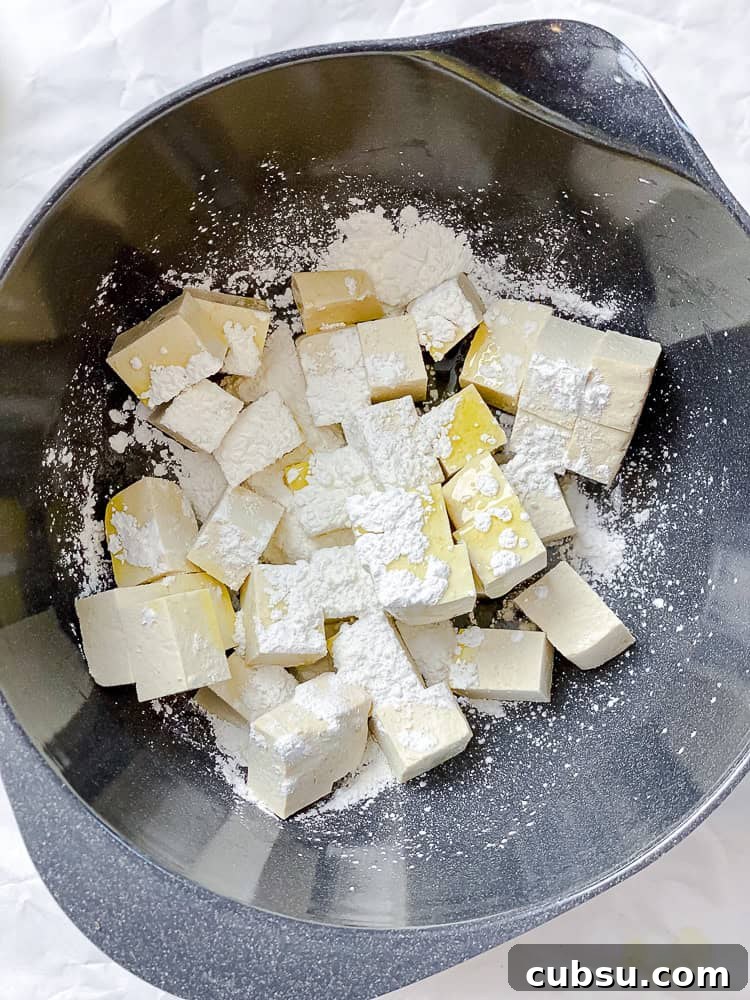 process shot showing tofu in bowl
