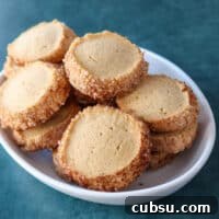 Snickerdoodle Sablé Cookies: Crispy, Buttery French-Style Treats 2 A plate of sable style snickerdoodle cookies.