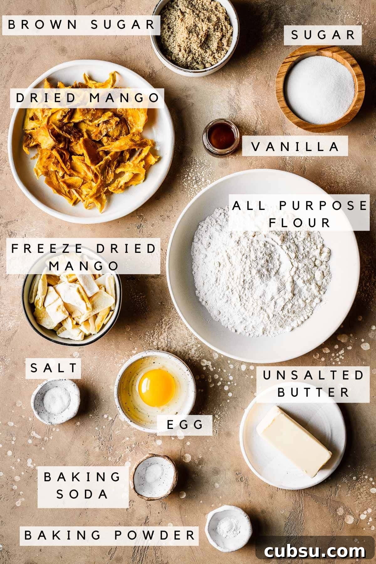 Labeled ingredients for a mango cookie recipe.