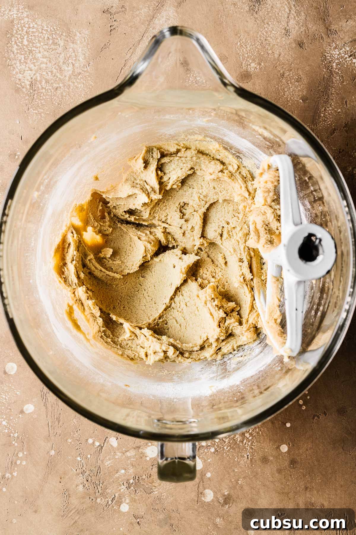 Dough for mango cookies with dry ingredients added.