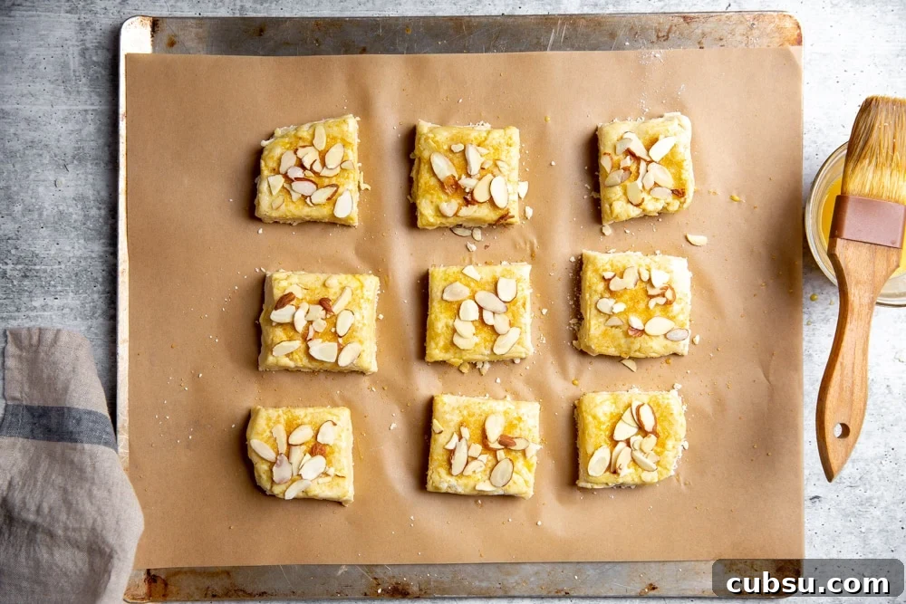 Process shot showing the shortcakes on a baking sheet before baking. 
