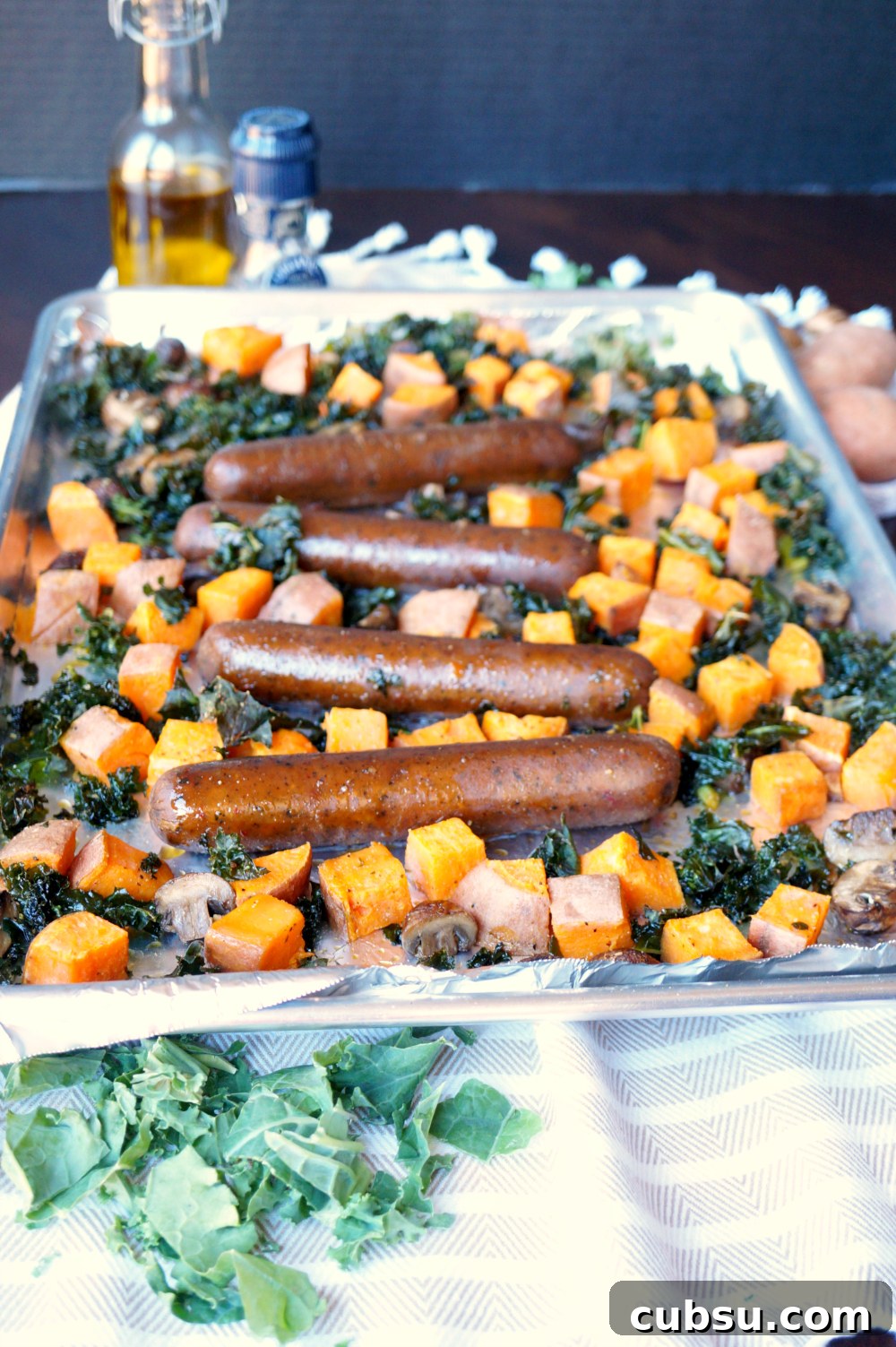 vegan sausage sheet pan meal with sweet potatoes and kale | The Baking Fairy