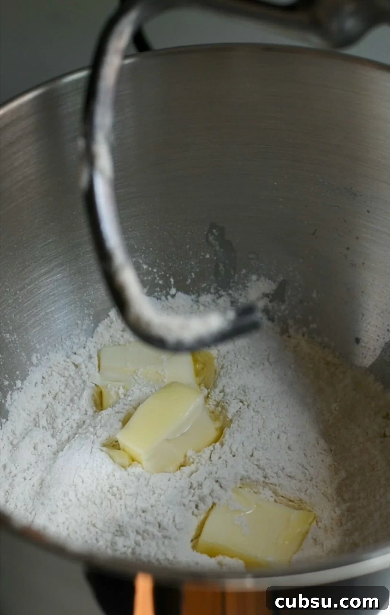 5 Essential Tips for Perfect Yeast Baking Every Time 3 Dough being mixed together.